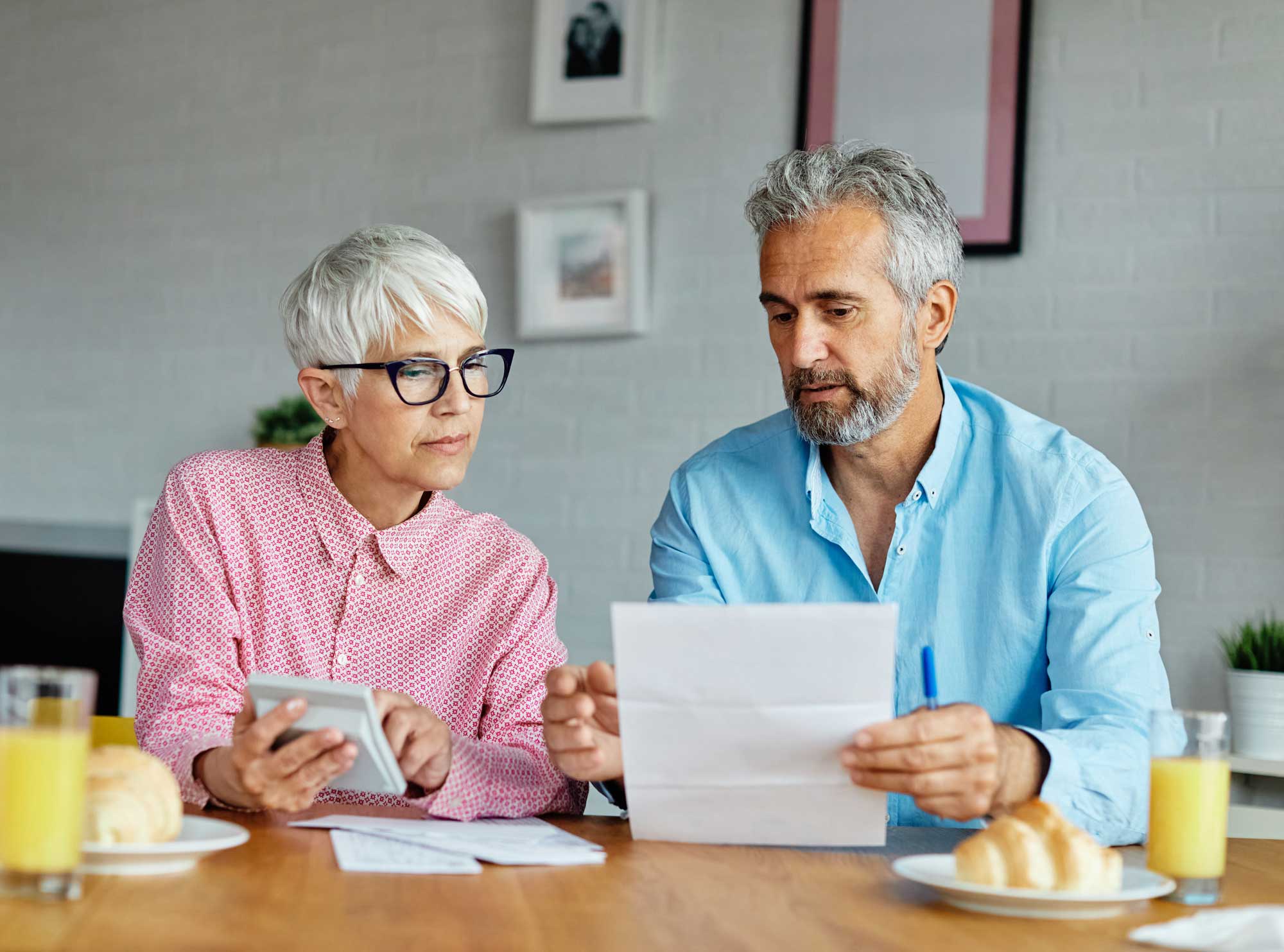 mature couple looking at finances